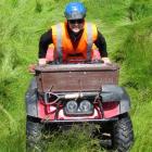 Marieke Gerhards, of Waimate, about to take a quad bike down a hill at the Oamaru racecourse...
