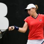 Marina Erakovic, New Zealand in action against Alize Cornet, France during their first round...