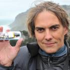 Marine scientist Dr Thomas Mattern, at Boulder Beach, with one of his innovative video cameras...