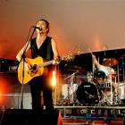 Mark Williams (centre) performs with Dragon. The popular New Zealand band has been announced as...