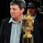 Martin Snedden with the William Webb Ellis Trophy at the Dunedin Public Art Gallery yesterday....