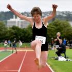 Mary Ann Bishop competes in the women’s 50 plus long jump in the Masters Games at the Caledonian...