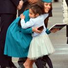 Mataawhio Matahaere-Veint (5) hugs the Duchess of Cambridge at Dunedin International Airport...