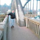 Mataura Community Board chairman Bill Lee stands beside the Mataura Bridge last year after it had...