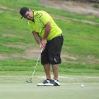 Matt Tautari attempts to hole a putt on the 15th green at St Clair Golf Club yesterday. The shot...