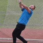 Matthew Bloxham, of Auckland, in action in the throws battery pentathlon at the Caledonian Ground...