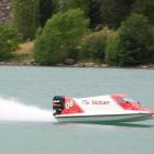 Matthew Pope, of Gore, drives his boat 'The Vatican', for the Lake Dunstan Power Boat Club, on...