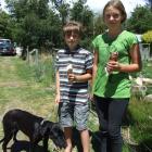 Max (9) and Lucy (11) Lorimer, of Ophir, with their pet Pepper.