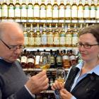 Meenan Wines and Spirits Ltd managing director John Eckhoff and 2014 New Zealand International...