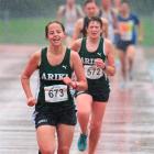 Melissa Halley finishes strongly to win the Caledonian Society Mile on Saturday. Behind her is...