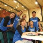 Members of the volleyball team are (back row, from left) Antonette Barrimond, Rommel Salonga,...