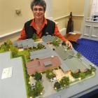 Methodist Mission chief executive Laura Black with a model of the mission's proposed social...