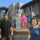 Michael Beazley, with (from left) daughters Portia (9), Alyssa (10) and wife Deborah Wai Kapohe,...