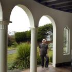 Michael Findlay inspects the archways and beamed ceiling at the entrance to the Hudson house. The...