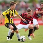Michael McGlinchey of the Phoenix controls the ball during the match against Western Sydney....