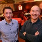 Mike (left) and Neville Hall at the Nanking Palace Restaurant yesterday. Photo by Stephen Jaquiery.