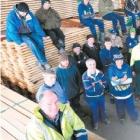 Millstream Lumber manager Murray Daniel (foreground) and his staff of about 50 employed at the...