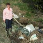Milton farmer Rachal Fegan is disgusted after household rubbish was dumped on the roadside next...