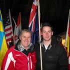 Minister of Major Events Development David Carter holds the New Zealand flag with New Zealand...