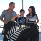 Morgan James shows off her three gold medals,  watched  by her proud parents Bruce and Sally...