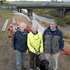 Mosgiel residents Geoff Neilson (left) and Alison Jones (with guide dog Zen) and Otago regional...