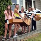 Moving stored items from last year's flat on Dundas St are University of Otago students (from...