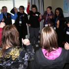 MP Lianne Dalziel (far right), participates in a group ice-breaker activity to start a workshop...