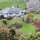 Mrs Hellyer's house is set in the garden she has created over the past 20 years. The kowhai ...