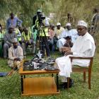 Muhammodu Buhari addresses a news conference outside his house after he voted in Daura in the...