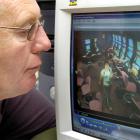 Murray Galland, of the Cableways Tavern, reviews CCTV footage of the woman alleged to have...