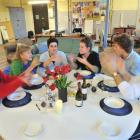 Nathan Mudge (third from left) plays a deaf young man exploring ways of communicating with his...