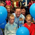 National Party leader John Key enjoys a campaign photo opportunity in Nelson. Photo by NZPA.