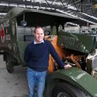 National Transport and Toy Museum curator Jason Rhodes with the 1915 Rover Sunbeam World War 1...