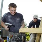 Naylor Love carpenters Aaron Shaw (left) and Eion Park work on an accommodation block at Dunedin...