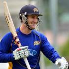 Neil Broom trains at the University Oval. Photo by Peter McIntosh.