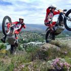 Nelson-based brothers Pete (17) and Nick Oliver (19) scale rocks above Alexandra yesterday in...
