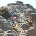 Nelson trials rider Nick Oliver (19), negotiates his way down a steep rocky face at Earnscleugh...