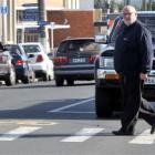Neville Poole wants action on the Green Island pedestrian crossing. Photo by Craig Baxter.