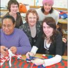 New horizons: Pictured above learning new skills in Maori fashion are (back from left) Sarah Ball...