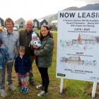 New landlords (from left) Sam, Dennis and Hana Deavoll, with Phoenix (3), Indy (5) and Sonny...