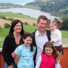 New National list MP Michael Woodhouse with his wife, Amanda, and daughters Emily (10), Isabel (8...