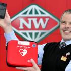 New World Centre City Dunedin manager Tony Watts with one of the defibrillators that are mapped...