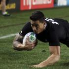 New Zealand All Blacks' Sonny Bill Williams scores a try during their Rugby World Cup Pool A...