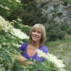 New Zealand cook and food writer Annabel Langbein picks elderflowers on a Wanaka roadside during...