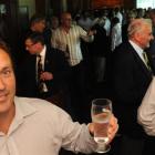New Zealand Cricket turf manager Ian McKendry raises his glass at the relaunch of the University...