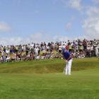 New Zealand golfer Josh Geary putts on the first green during the third round of the New Zealand...