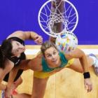 New Zealand's Bailey Mes (L) and Australia's Julie Corletto in action during their World Cup...