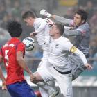 New Zealand's Chris Wood tries to outjump the South Korean defence. Photo by Getty