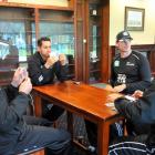 New Zealand's James Franklin, left, Ross Taylor, Kyle Mills and Daniel Vettori play 500 waiting...