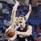 New Zealand's Kirk Penny drives to the basket against Russa in the Eight-Finals of the FIBA World...